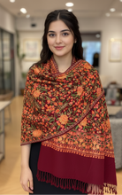 Load image into Gallery viewer, Woman wearing a patterned shawl in an indoor setting