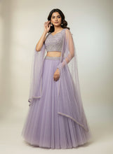 Load image into Gallery viewer, Woman wearing a lavender traditional outfit with a matching dupatta on a neutral background