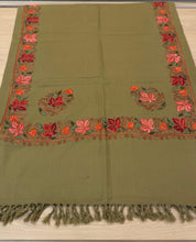 Load image into Gallery viewer, Green fabric with red and orange floral embroidery on a wooden surface
