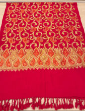 Load image into Gallery viewer, Red fabric with gold embroidery on a wooden surface
