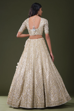 Load image into Gallery viewer, SEQUINS EMBROIDERED NET RECEPTION LEHENGA
