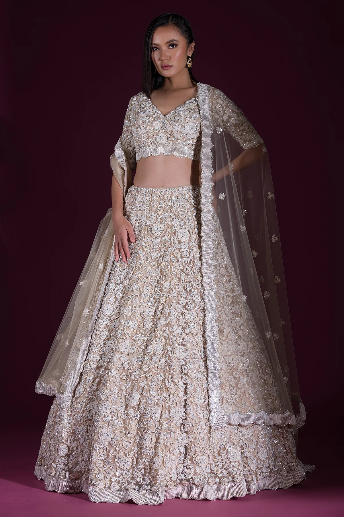 SEQUINS EMBROIDERED NET RECEPTION LEHENGA